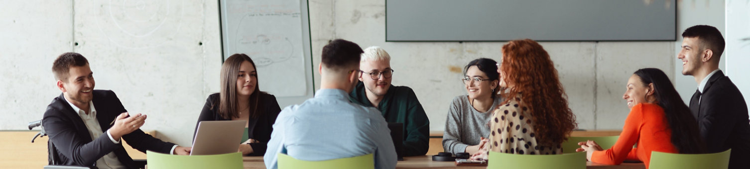 Wide crop photo of a diverse group of business professionals