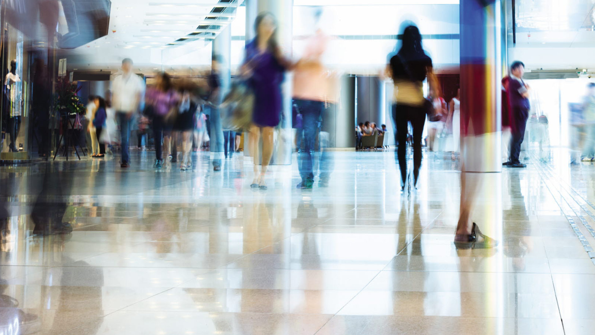 People walking in shopping centre