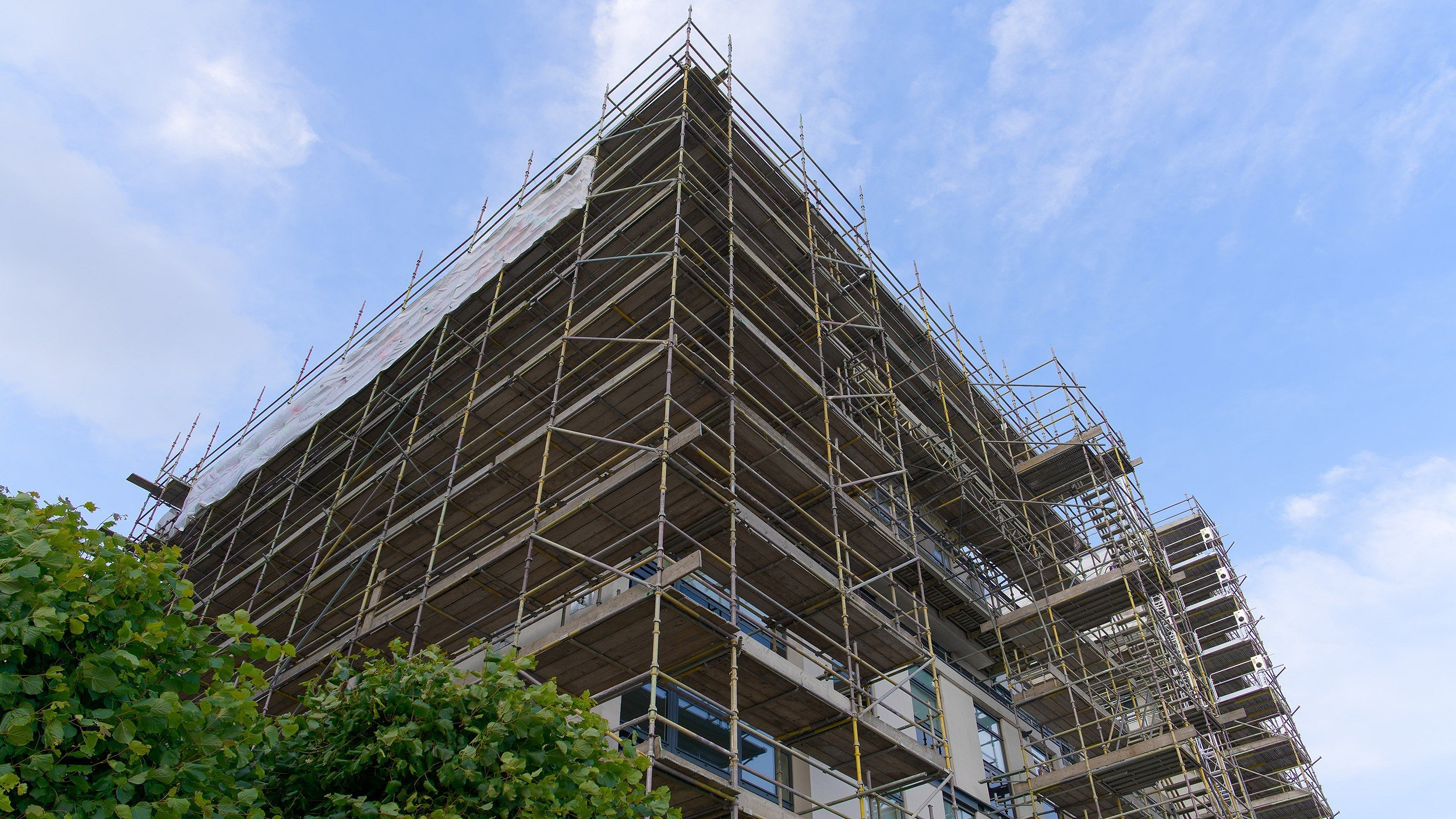 High rise residential building of flats with cladding being replaced with fire resistant materials