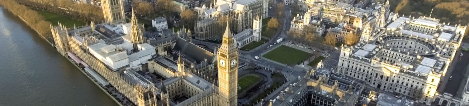 London Aerial Cityscape with Landmarks including the Thames, Big Ben Clock Tower and Parliament, Palace, Portcullis House and Westminster Square Garden