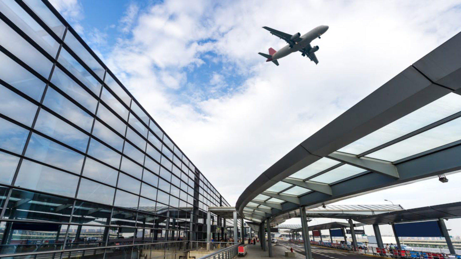 Airport with plane overhead