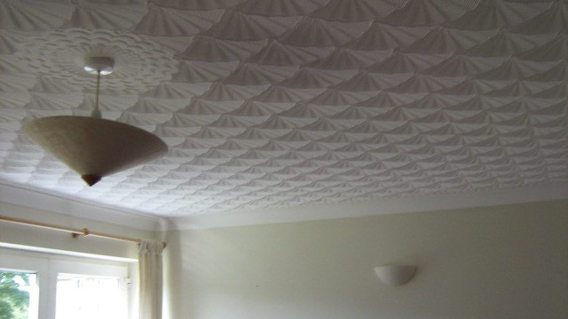 Asbestos containing textured ceiling finish