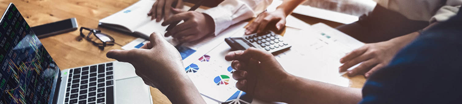 Business financial, accountant discussing with partner are meeting to audit finance planning sales to meet targets set in next year. stock market concept.