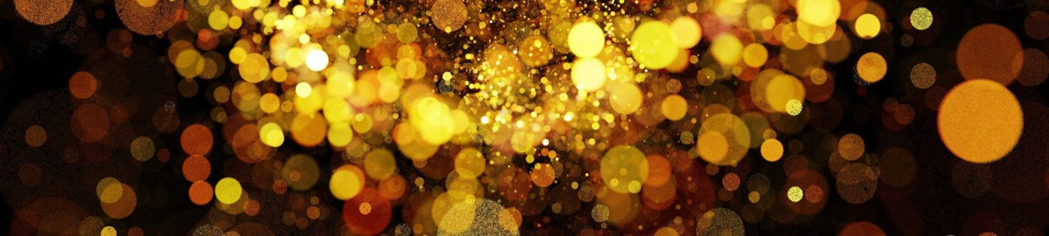 A sparkling gold bokeh pattern on a dark background