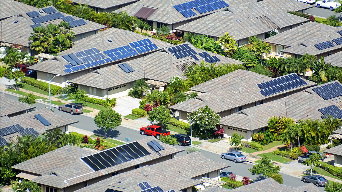 Aerial photo of houses with solar panels