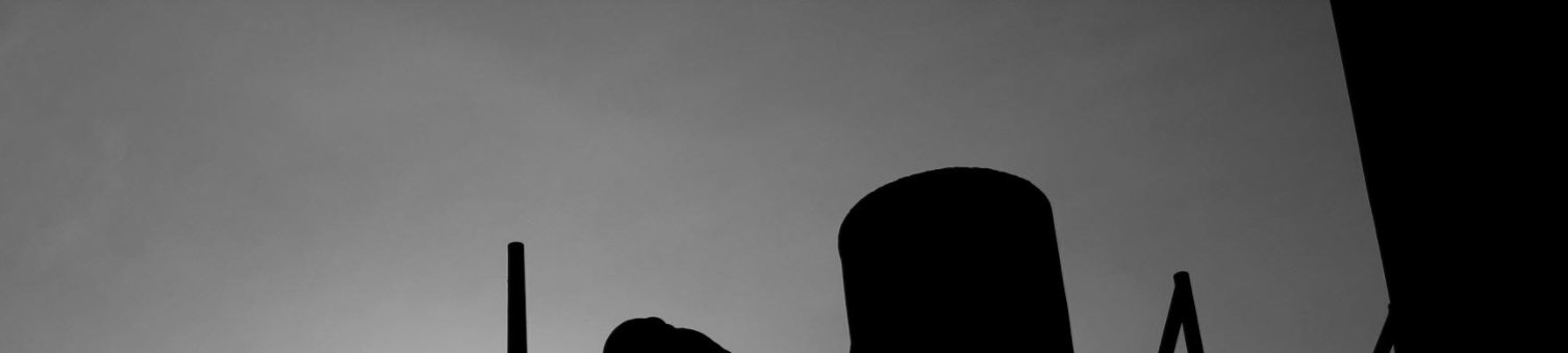 Person working on scaffolding silhouette 