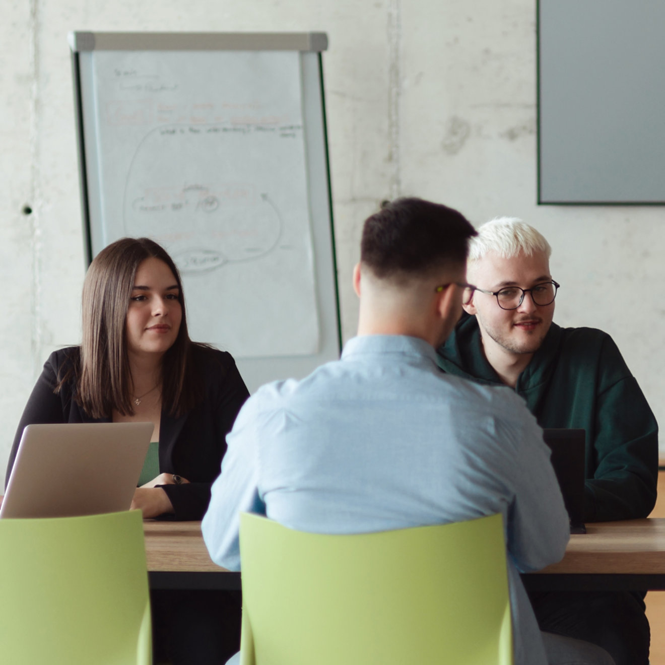 diverse group of business professionals talking