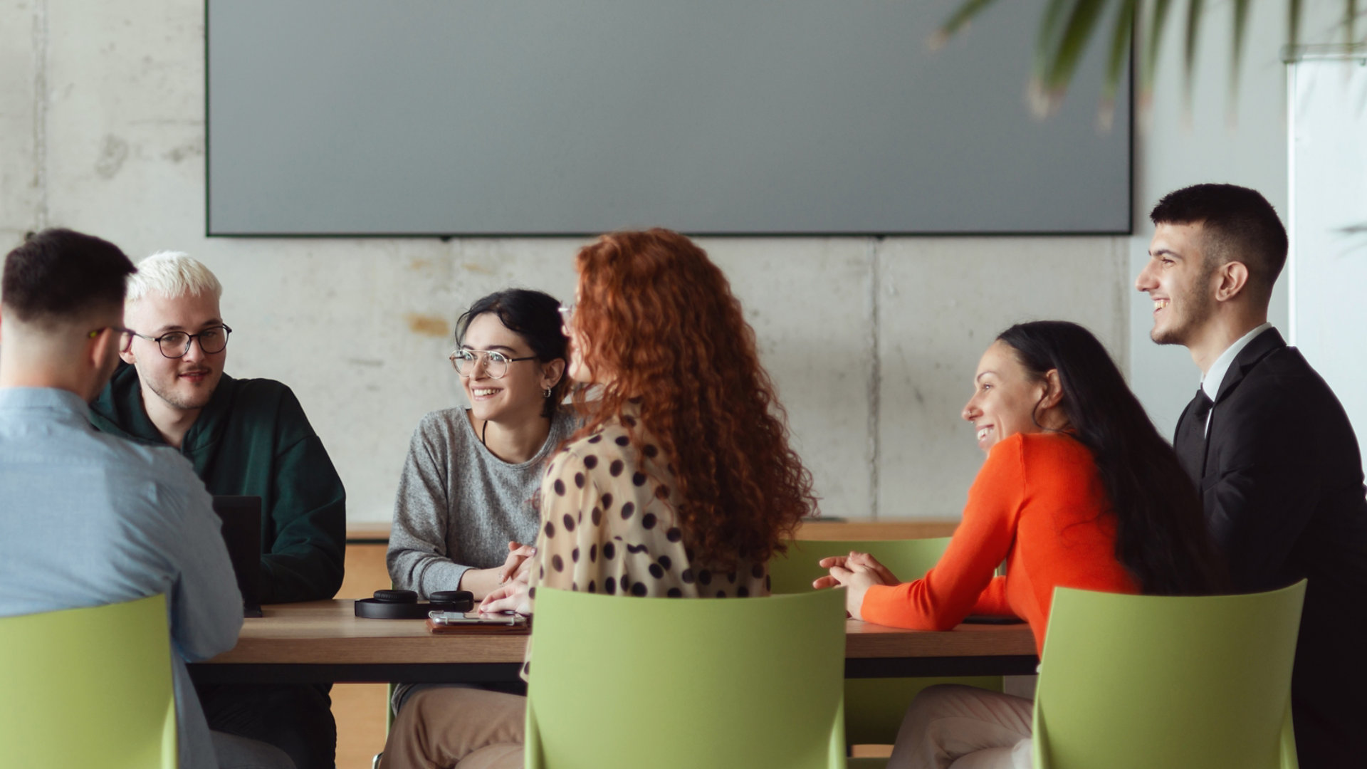 diverse group of business professionals talking