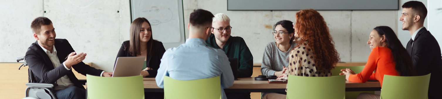 diverse group of business professionals talking