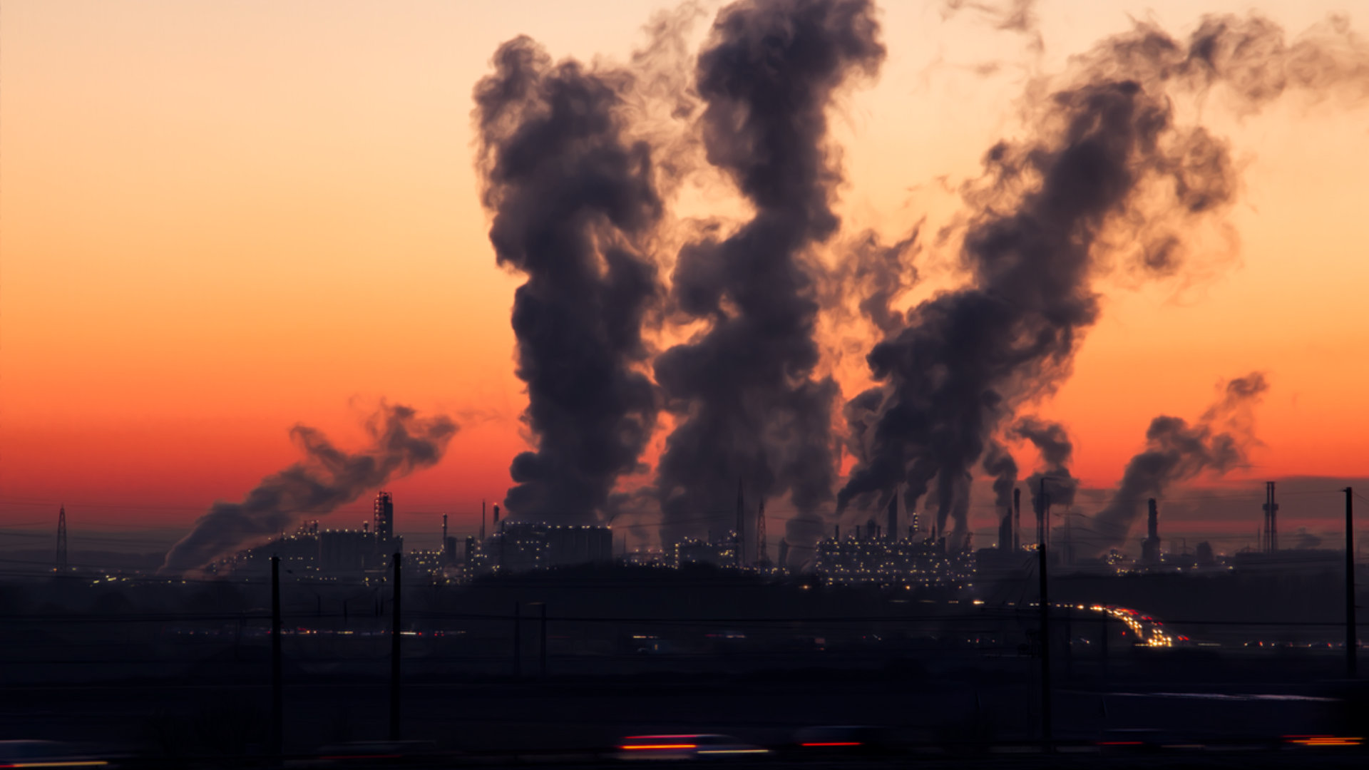 Smoke coming out of factory chimneys