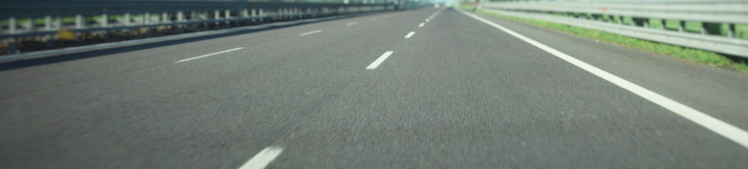 gray-asphalt-road-under-blue-sky.jpg