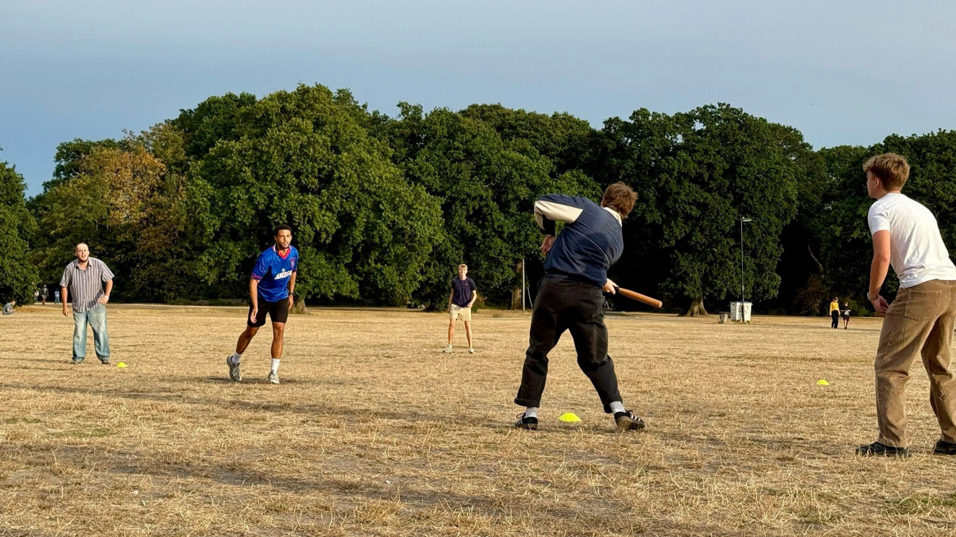 Matrics members playing cricket