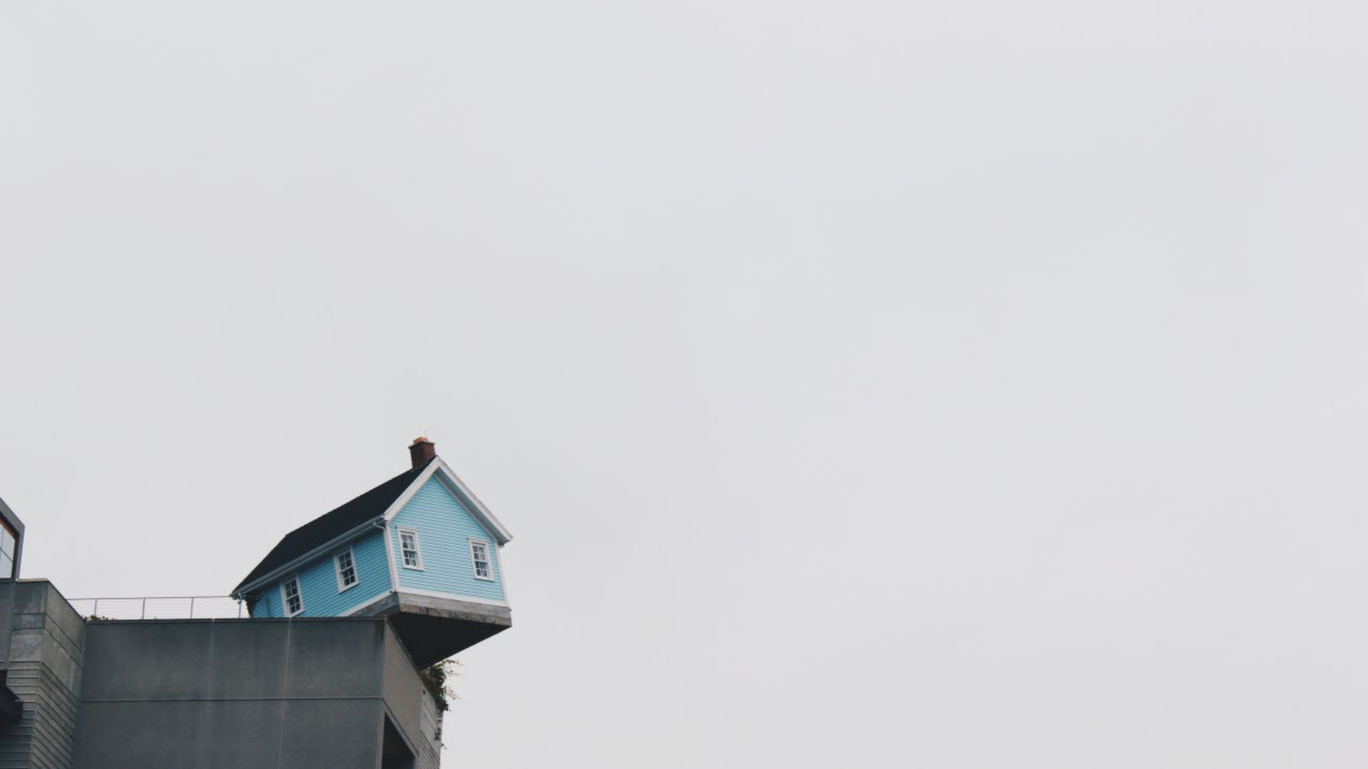 house falling off building
