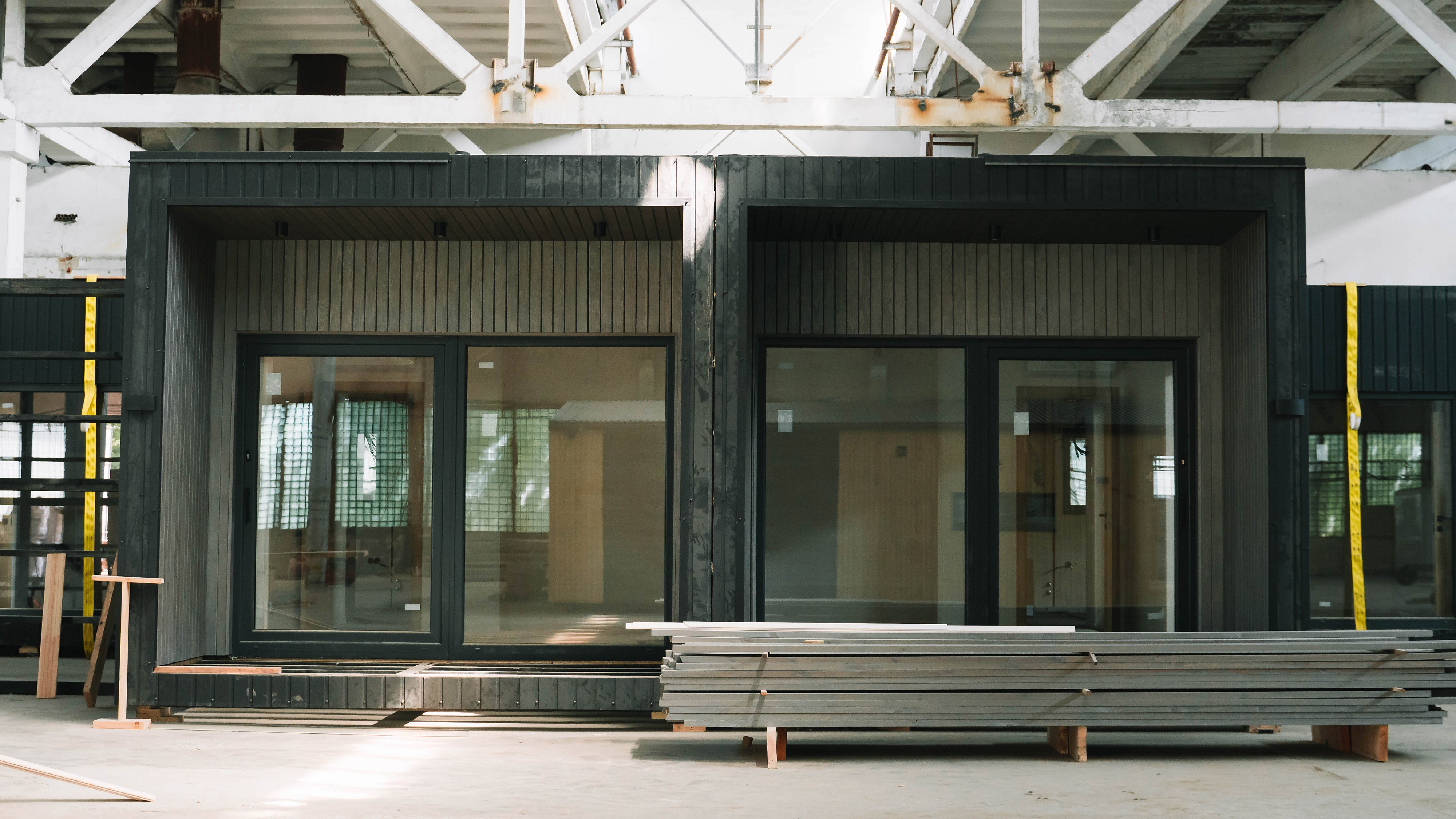 A new wooden modular prefabricated house inside in manufacturing facility