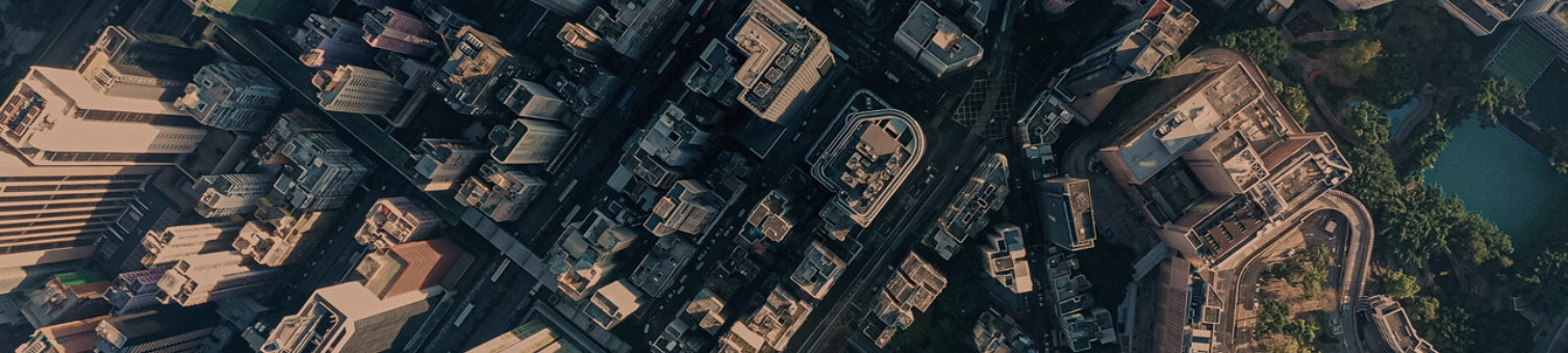AERIAL view of the huge city at the sunset. Drone footages of Hong Kong city. 