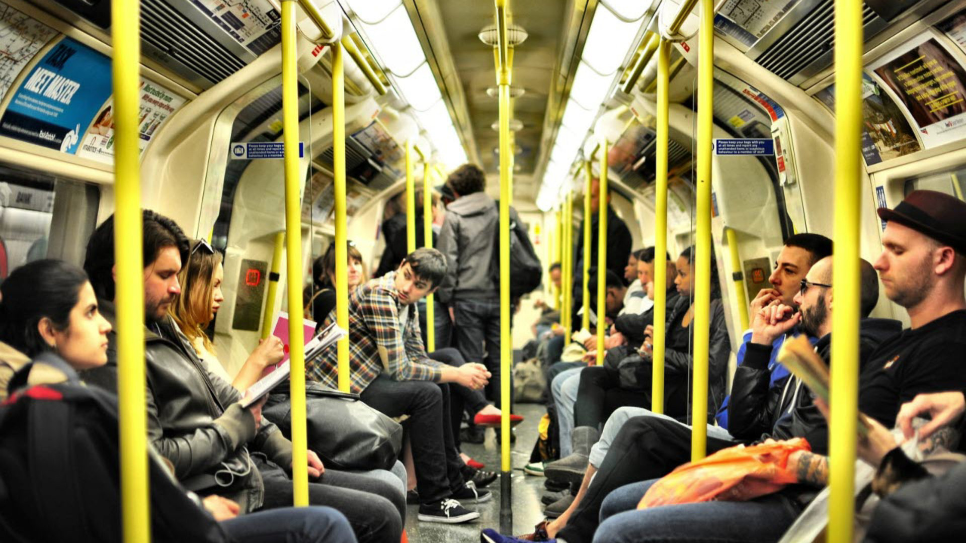 Busy carriage on a London Underground train