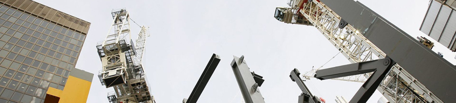 multiple-cranes-working-on-huge-construction-site