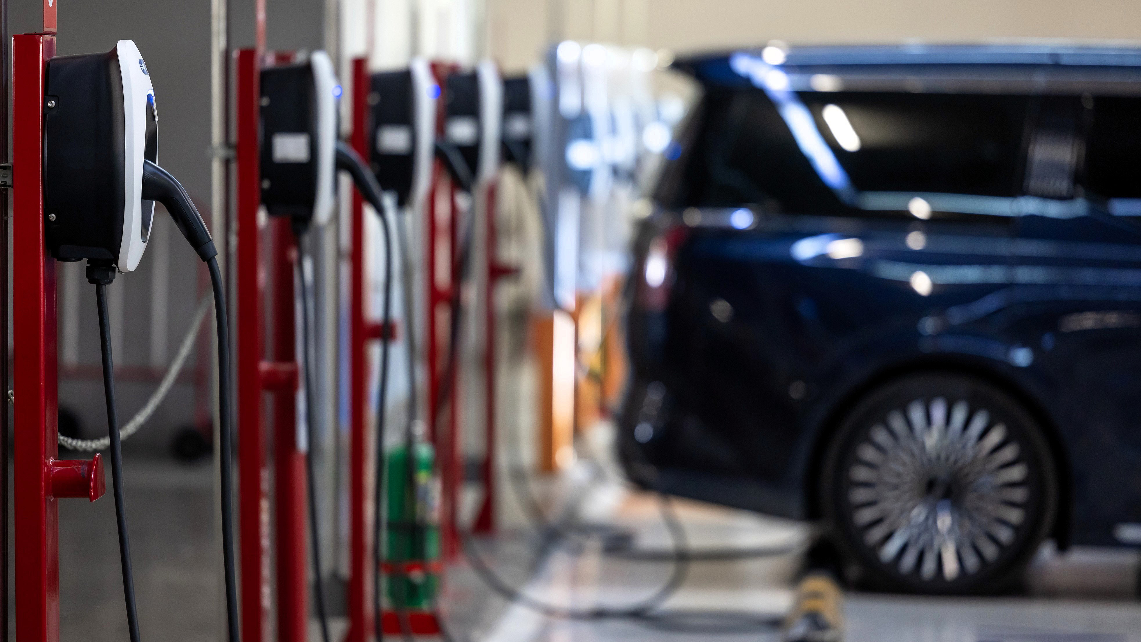Electric vehicle charging station in an underground car parking facility