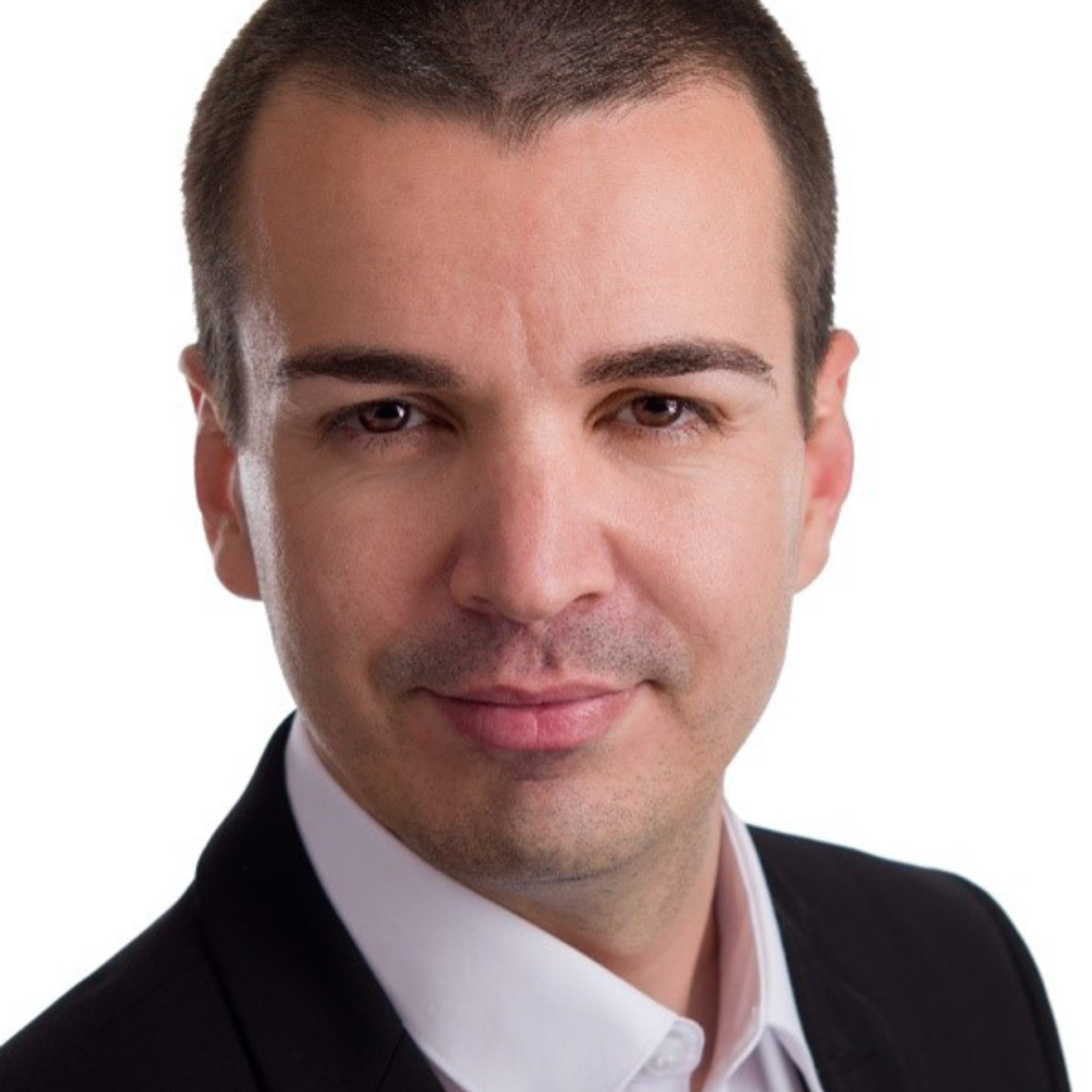 a headshot of nicky dobreanu