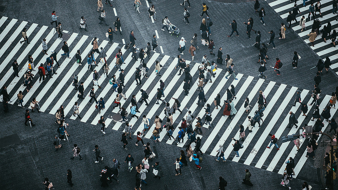 Image of people crossing a road