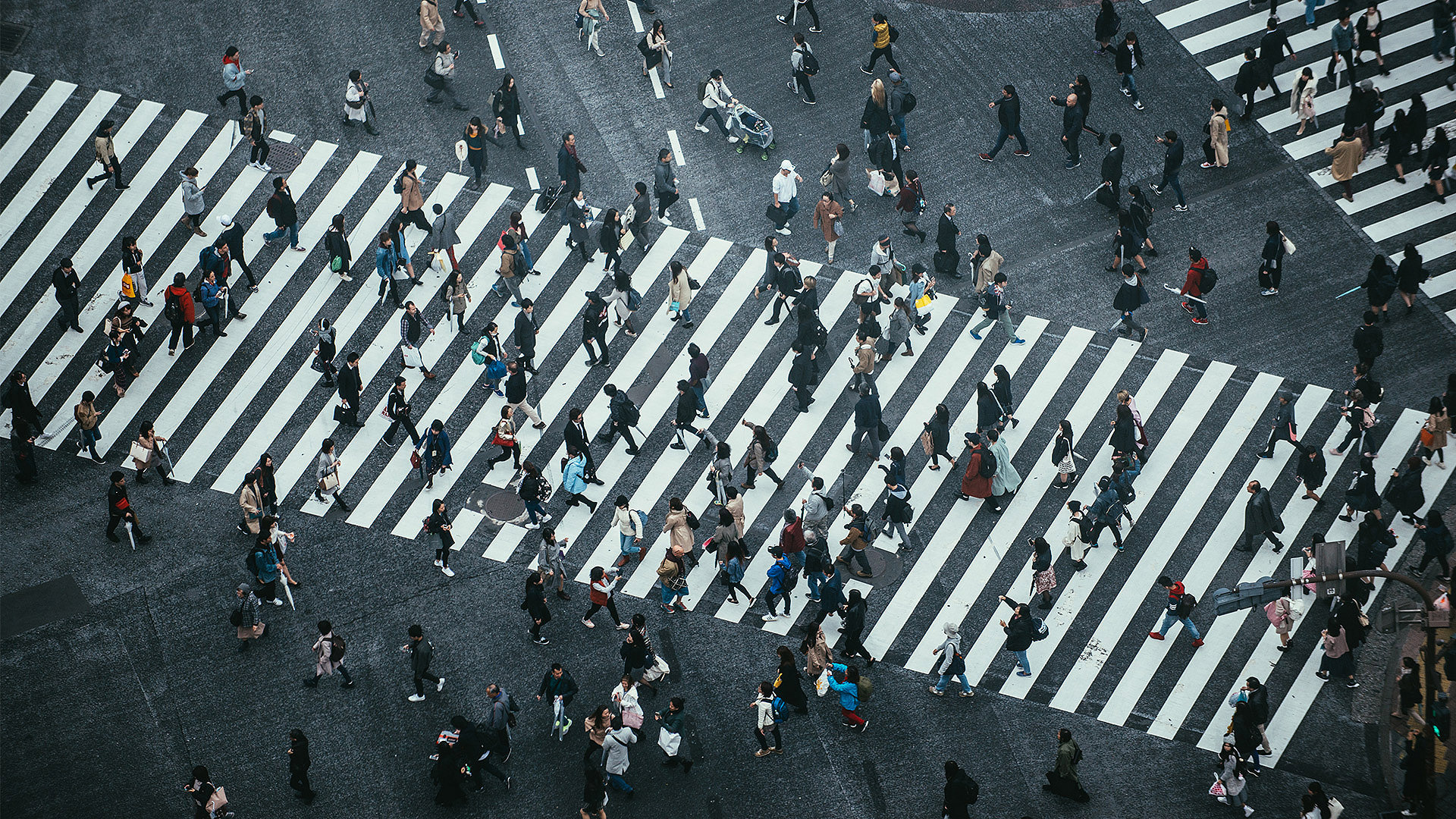 Image of people crossing a road