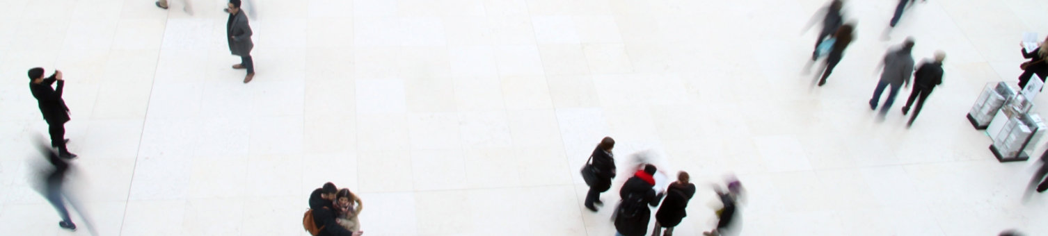 Crowd of people inside large public space
