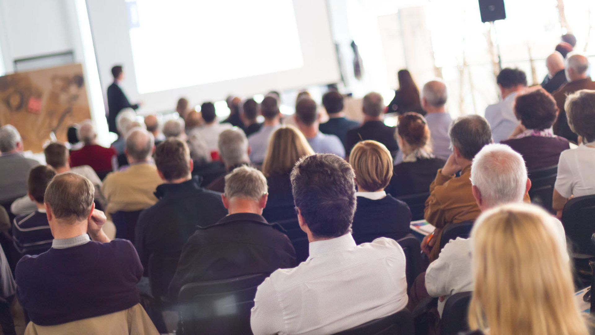 Presentation with people sitting down