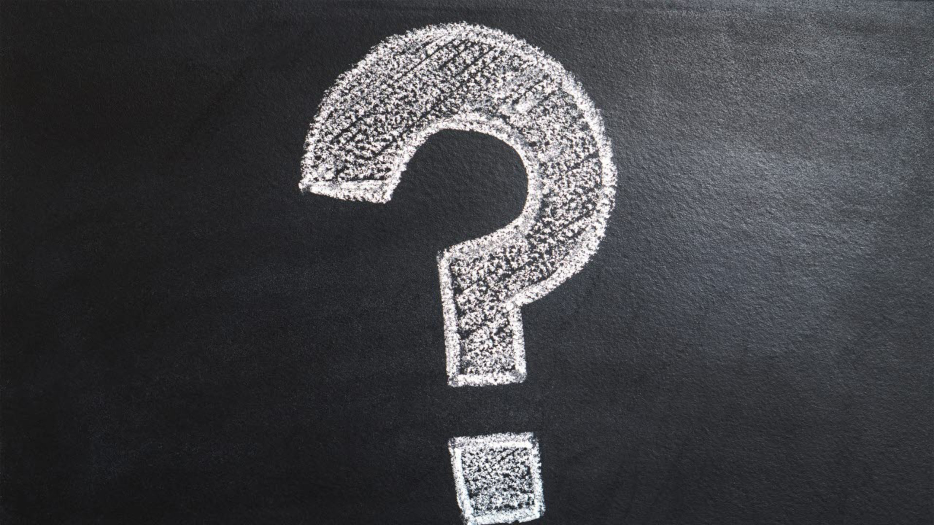 Question mark symbol on a chalk board