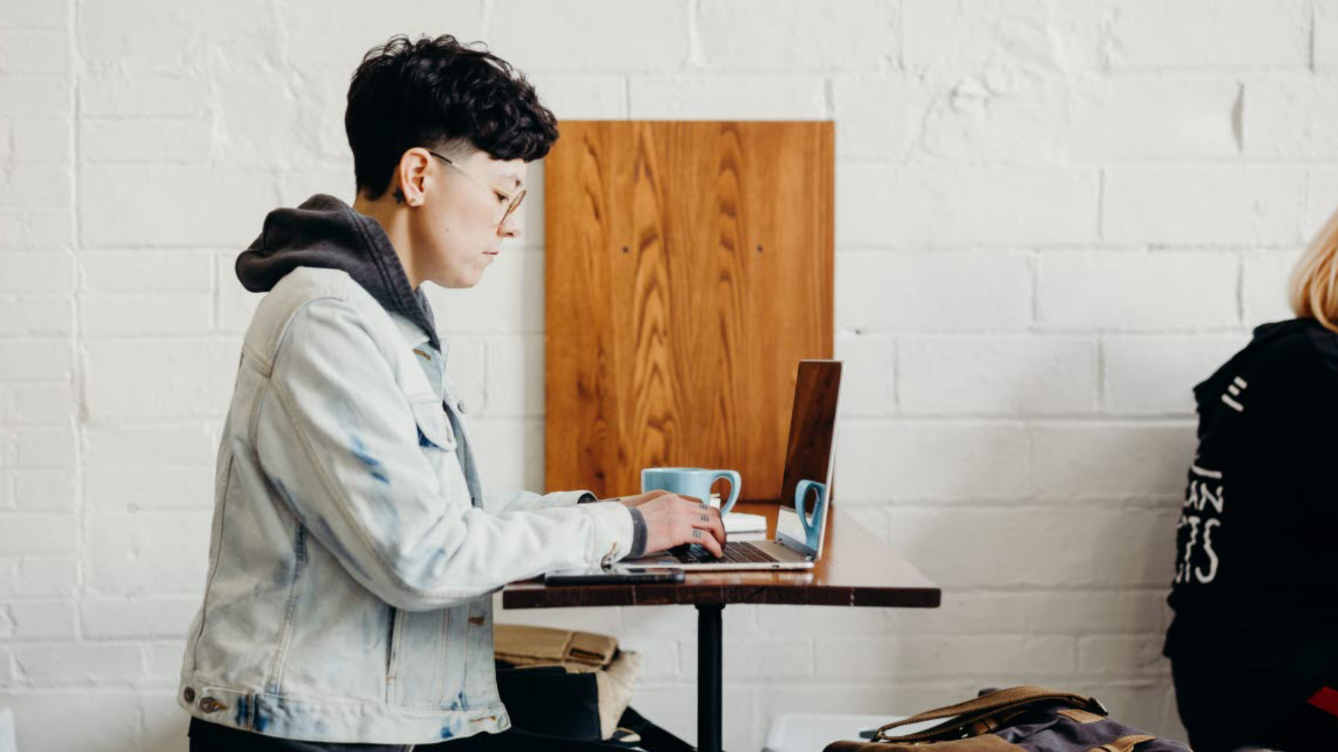 Person working remotely from a cafe