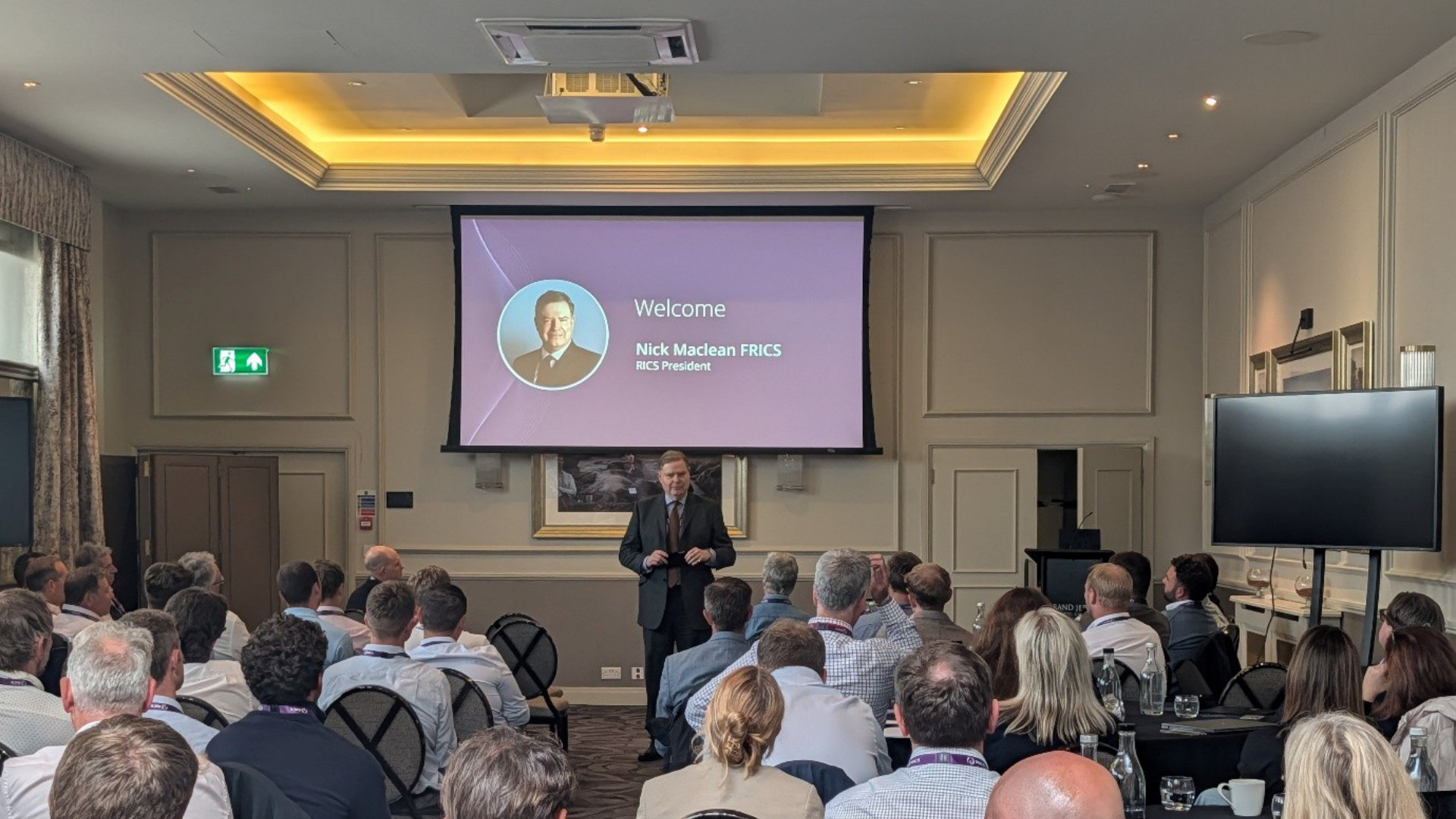 Nick MacLean FRICS, RICS President talking to a room of members at a Shaping the Future roadshow