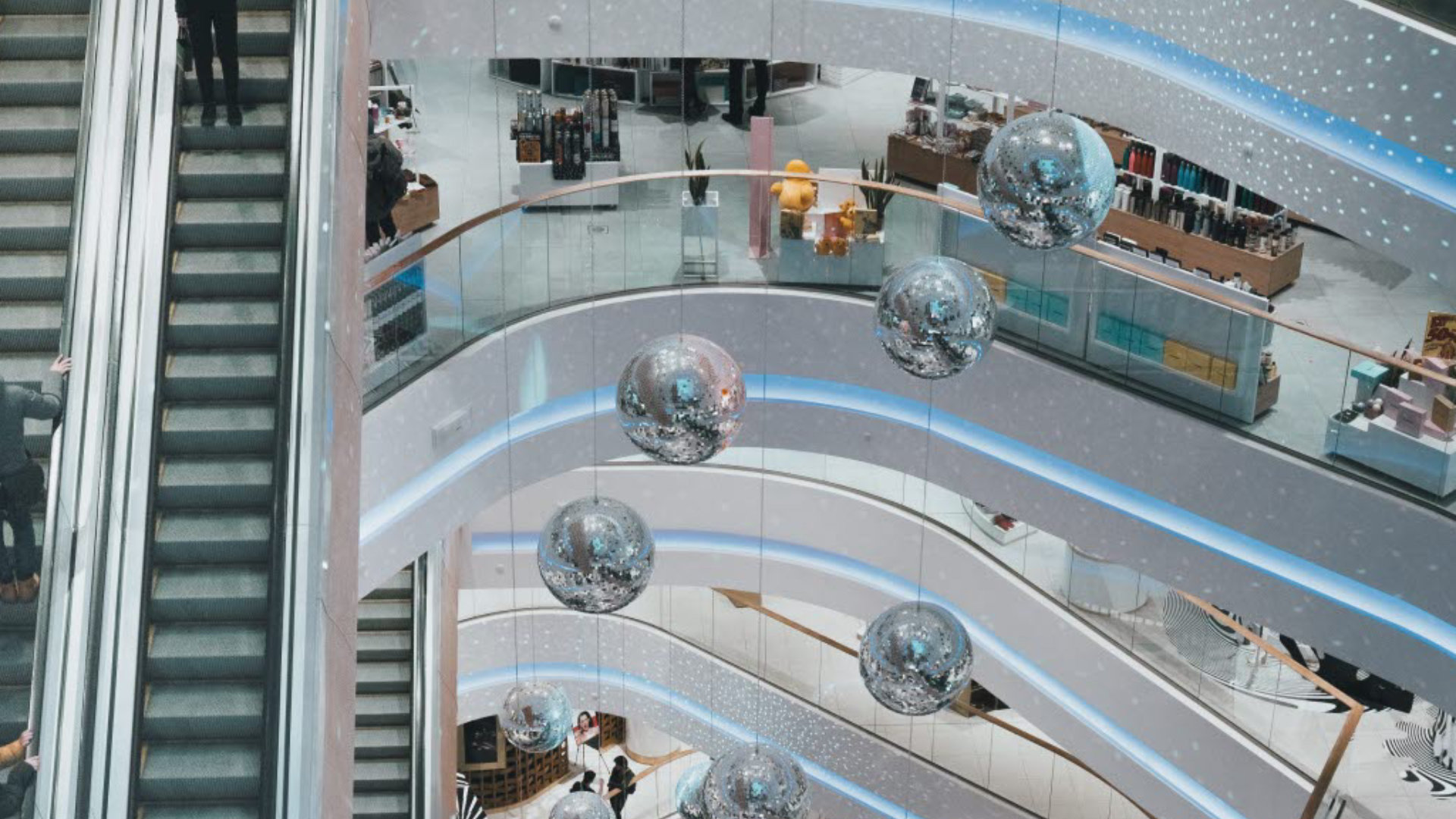 View from above of a shopping centre with escalators