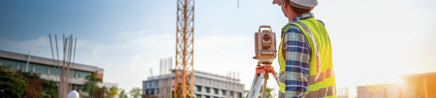Surveyor equipment. Surveyor’s telescope at construction site or Surveying for making contour plans is a graphical representation of the lay of the land startup construction work.