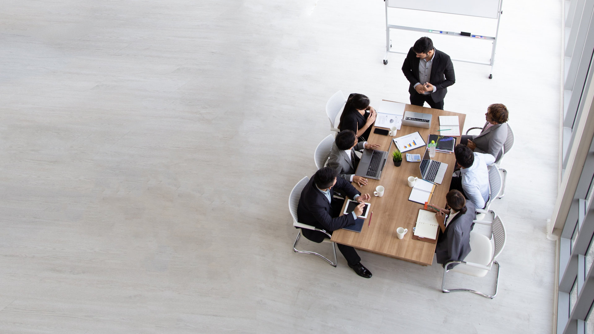 A birds eye view of a meeting taking place amongst colleagues