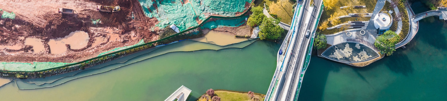An aerial view of a river in a city