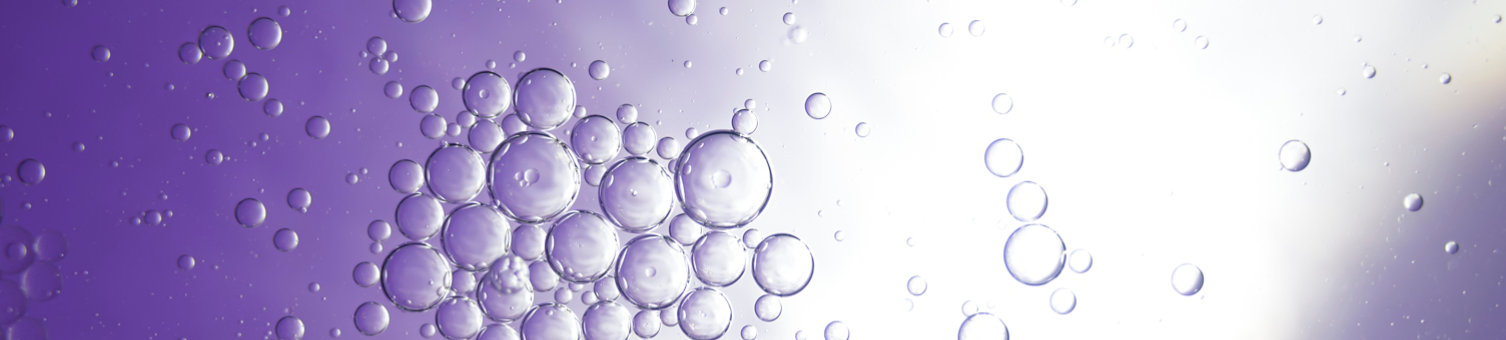 purple  background from small bubbles with sparkling reflections. There are many different sized round shaped bubbles. Stacked in layers, grouped together. mysterious and scientific; Shutterstock ID 2152764447; purchase_order: -; job: -; client: -; other: -