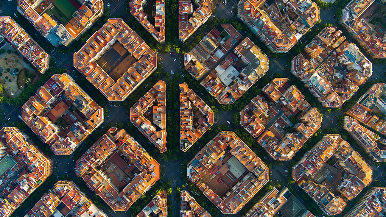 Aerial view of typical buildings of Barcelona cityscape. Eixample residential famous urban grid. Catalonia, Spain; Shutterstock ID 2165020871; purchase_order: -; job: -; client: -; other: -