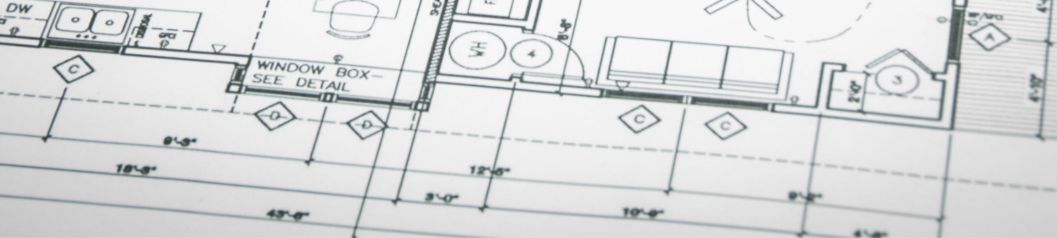 Architectural blueprints and blueprint rolls and a drawing instruments on the worktable; Shutterstock ID 246019015; purchase_order: -; job: -; client: -; other: -