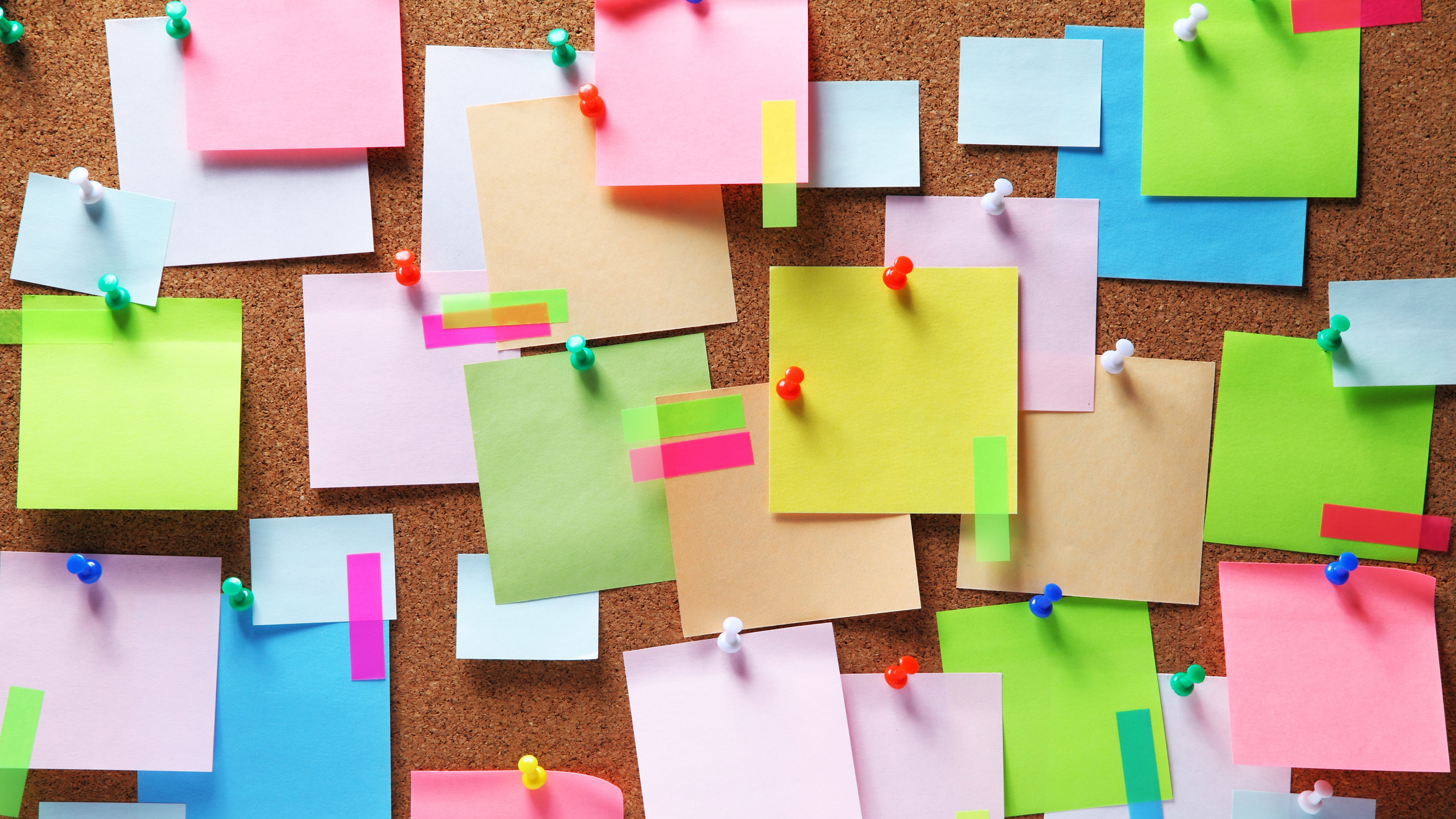 Blank sticky notes attached to a board