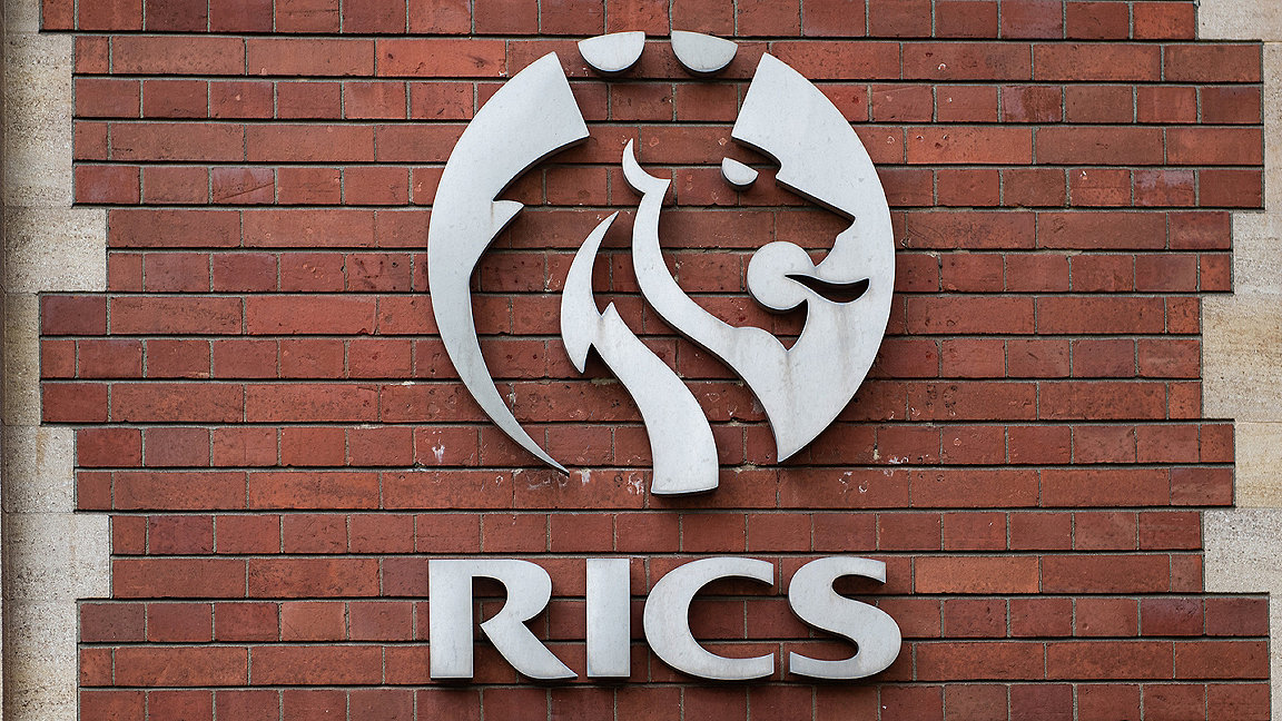 RICS logo against the brick facade of the RICS London headquarters