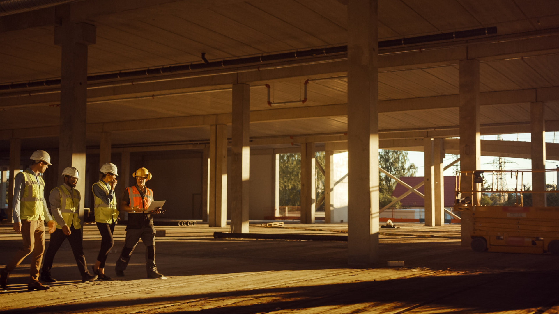 Construction workers sunset