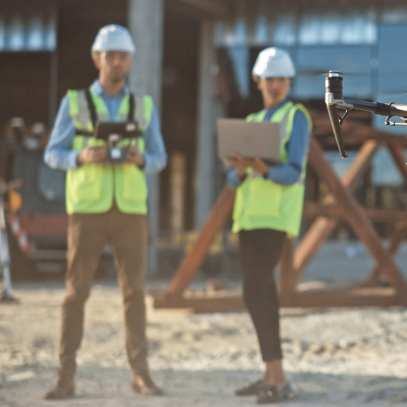 Surveyors using a drone