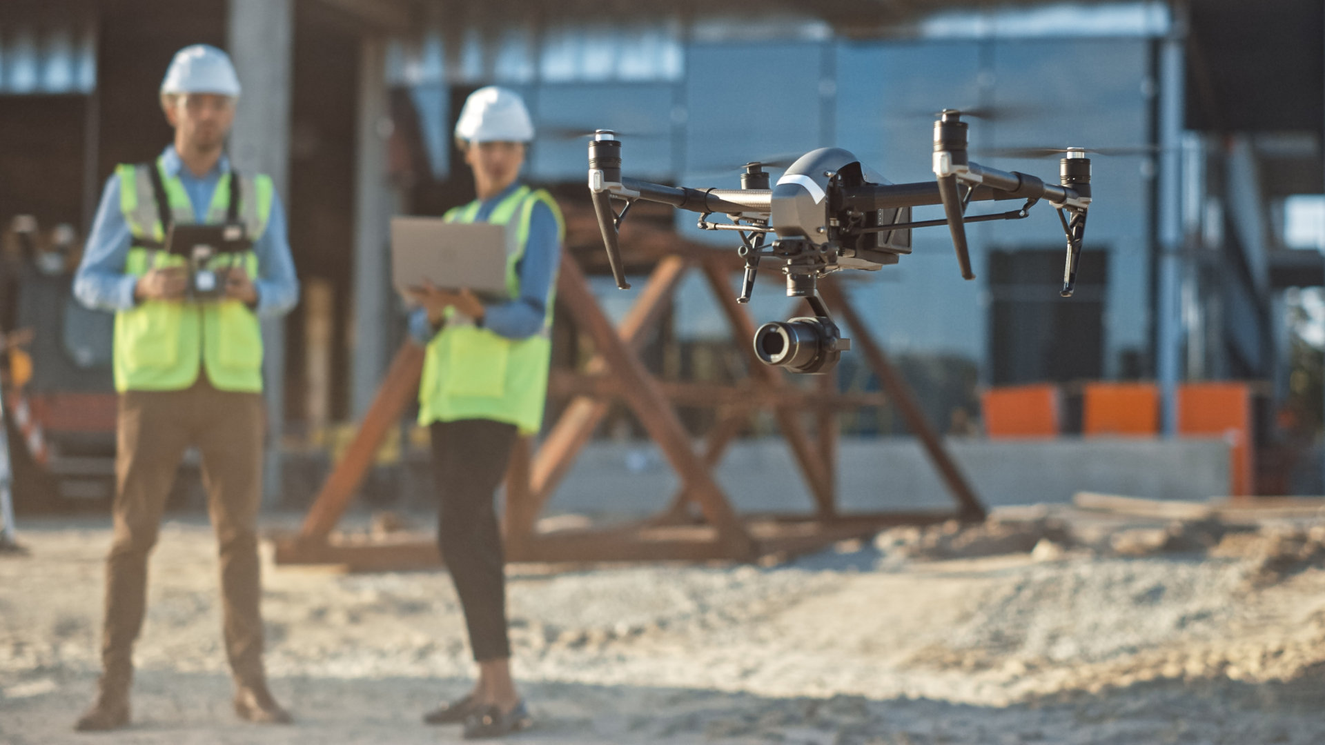 Surveyors using a drone