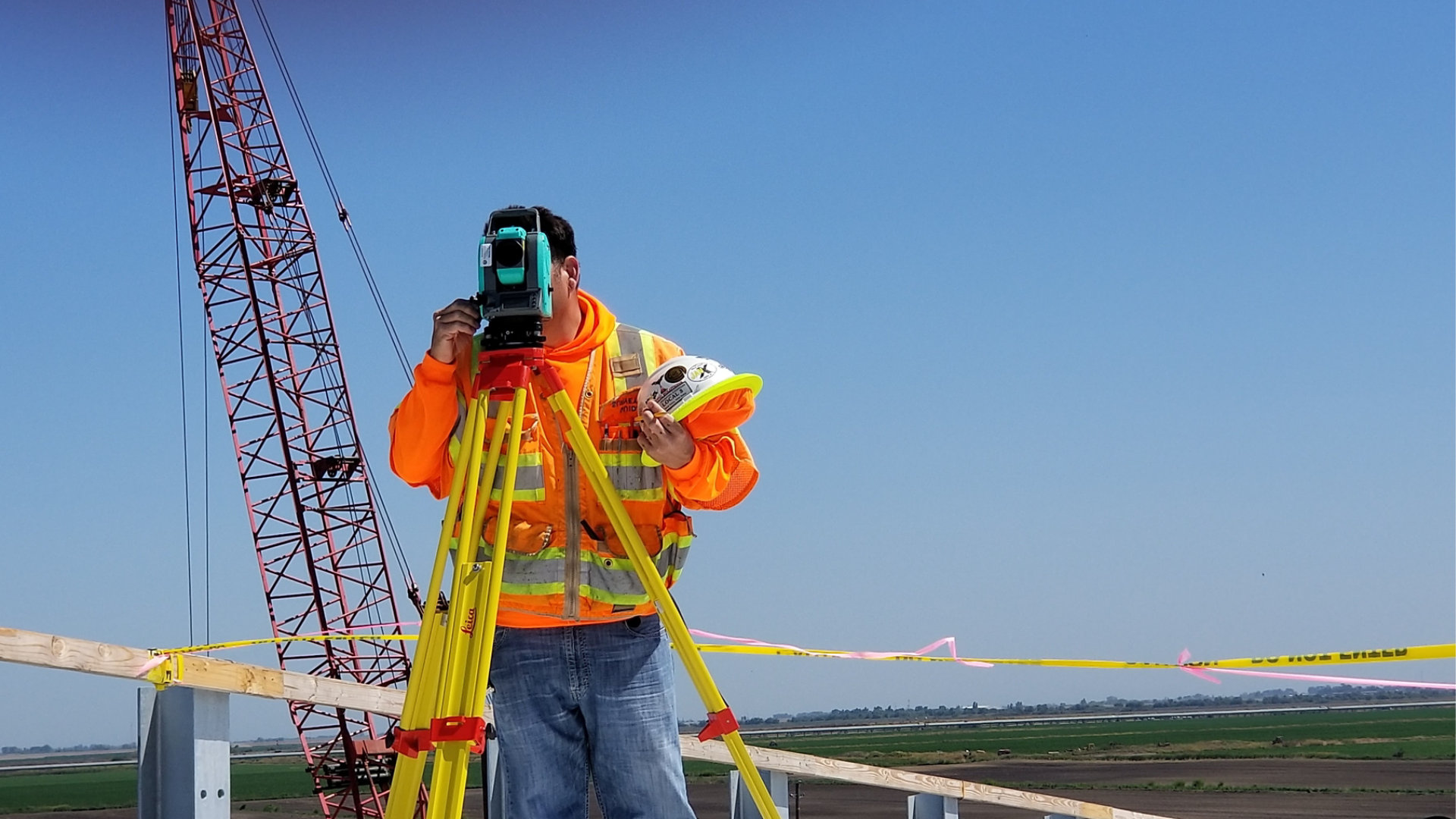 Surveyor on construction site