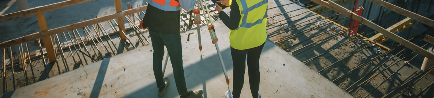 Surveyors working on a construction site