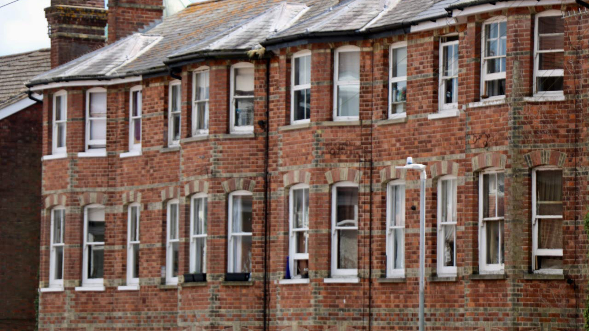 Row of red brick terraced houses