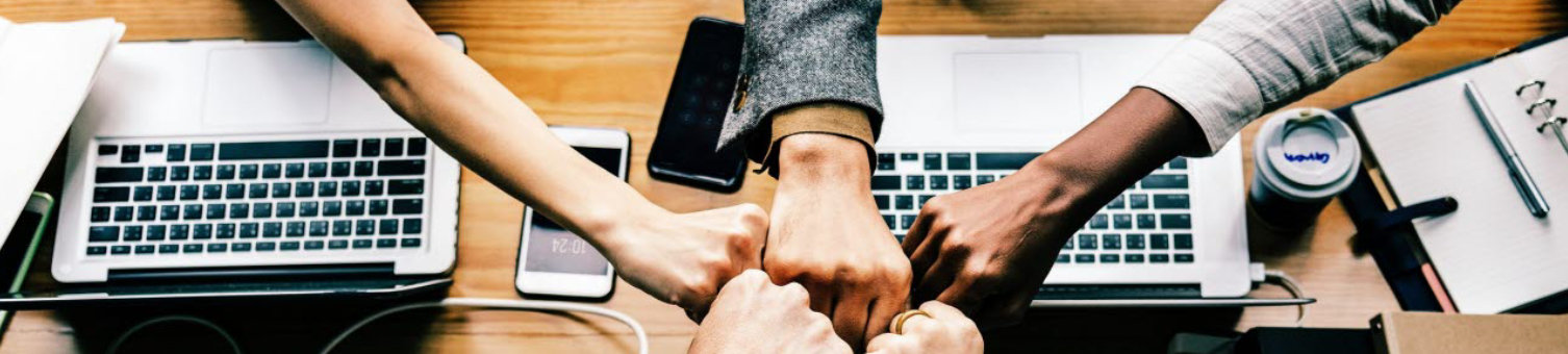 women-fist-bump