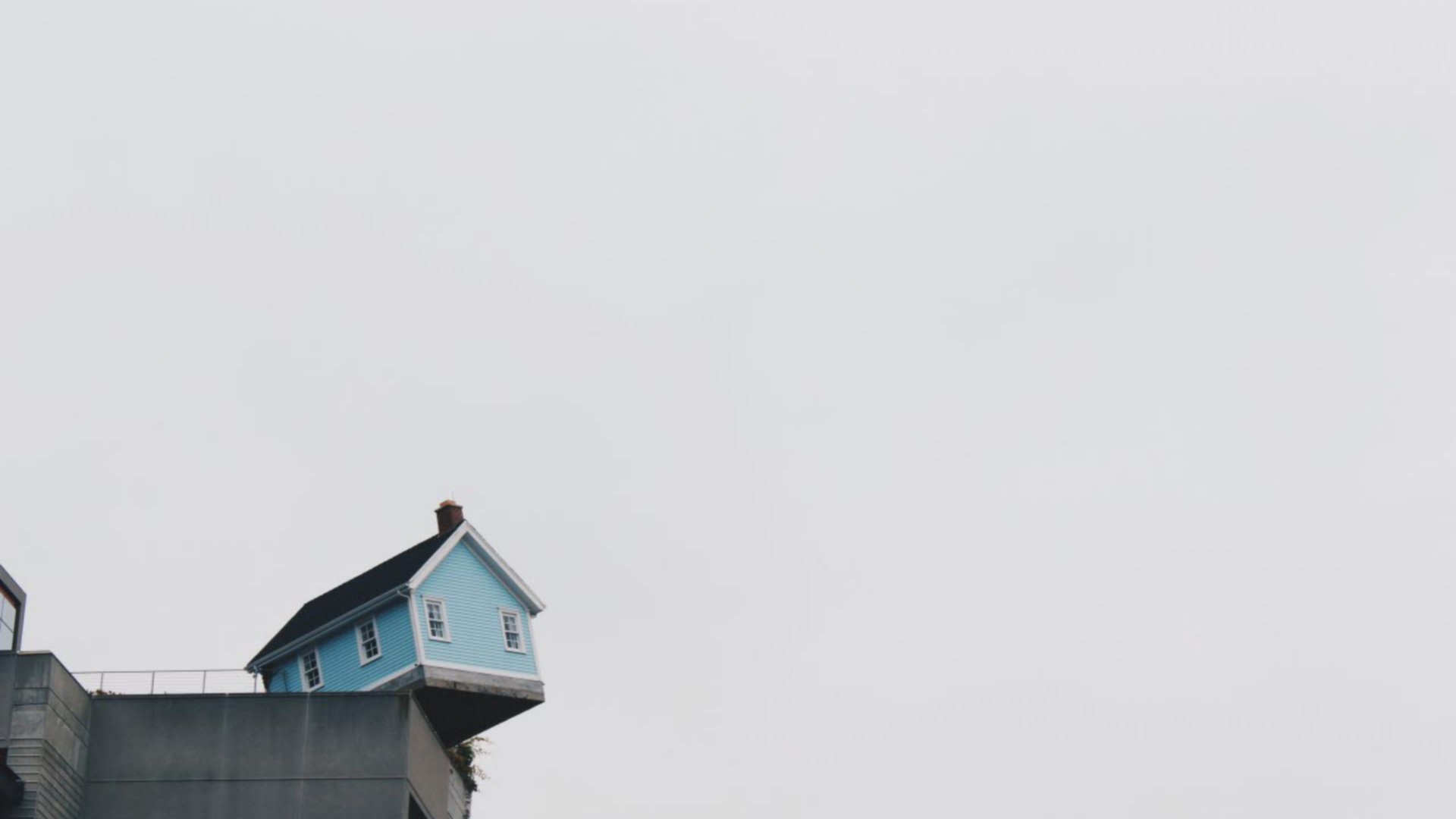 house falling off building