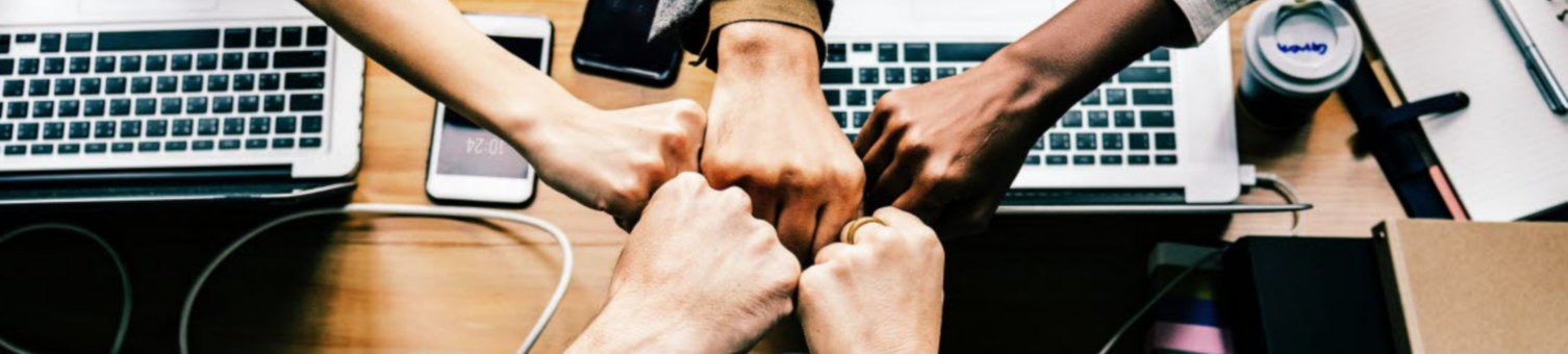 women-fist-bump